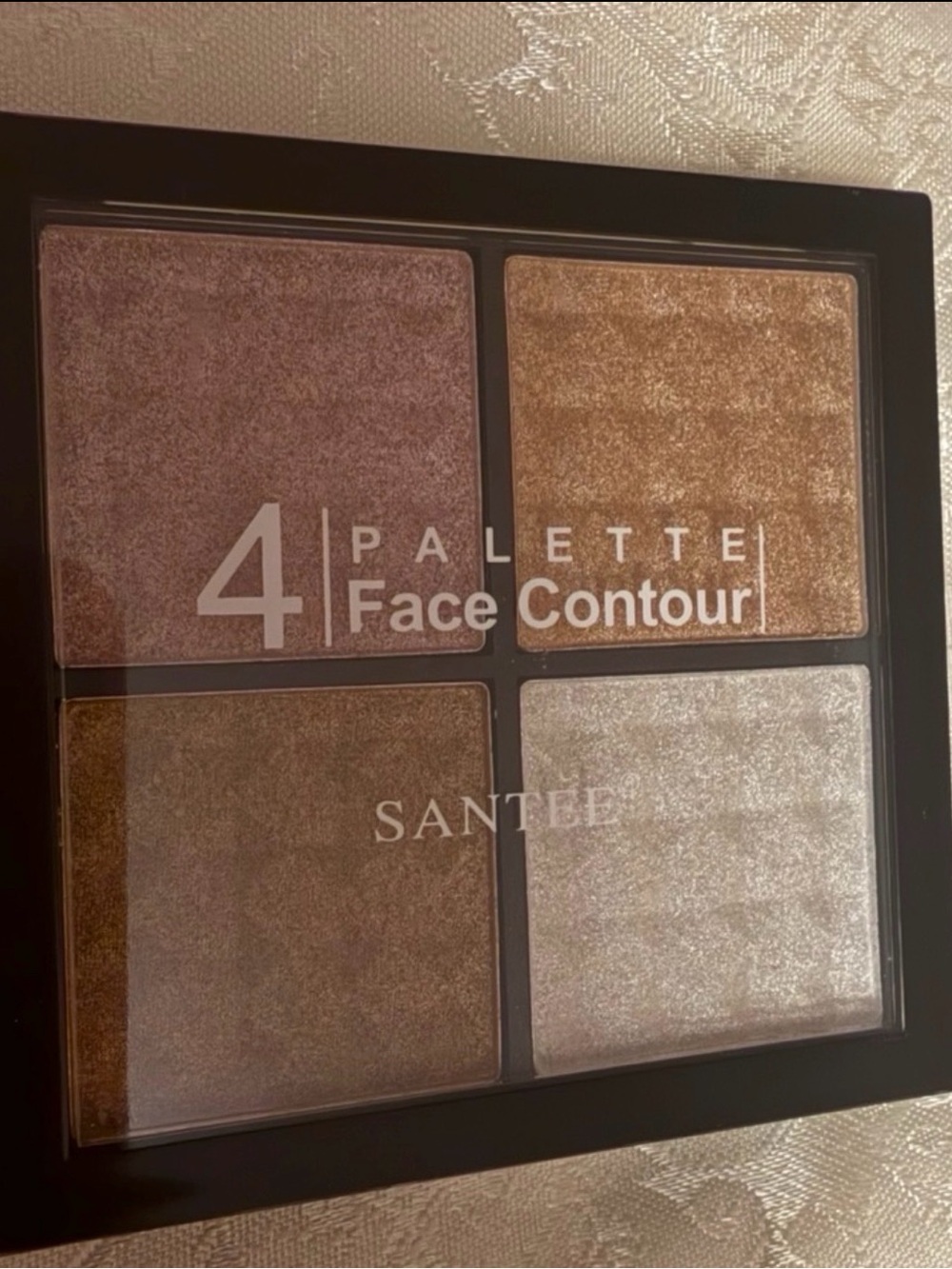 Santee Face Contour Palette featuring four pigmented shades in a black case.